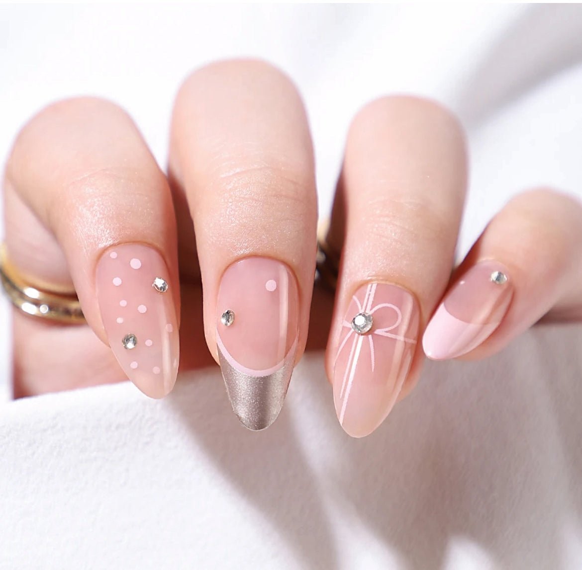 Mixed Art Bow And Metallic Tip Winter Nails Mixed Art Bow And Metallic Tip Winter Nails β Medium Winter Almond Nails