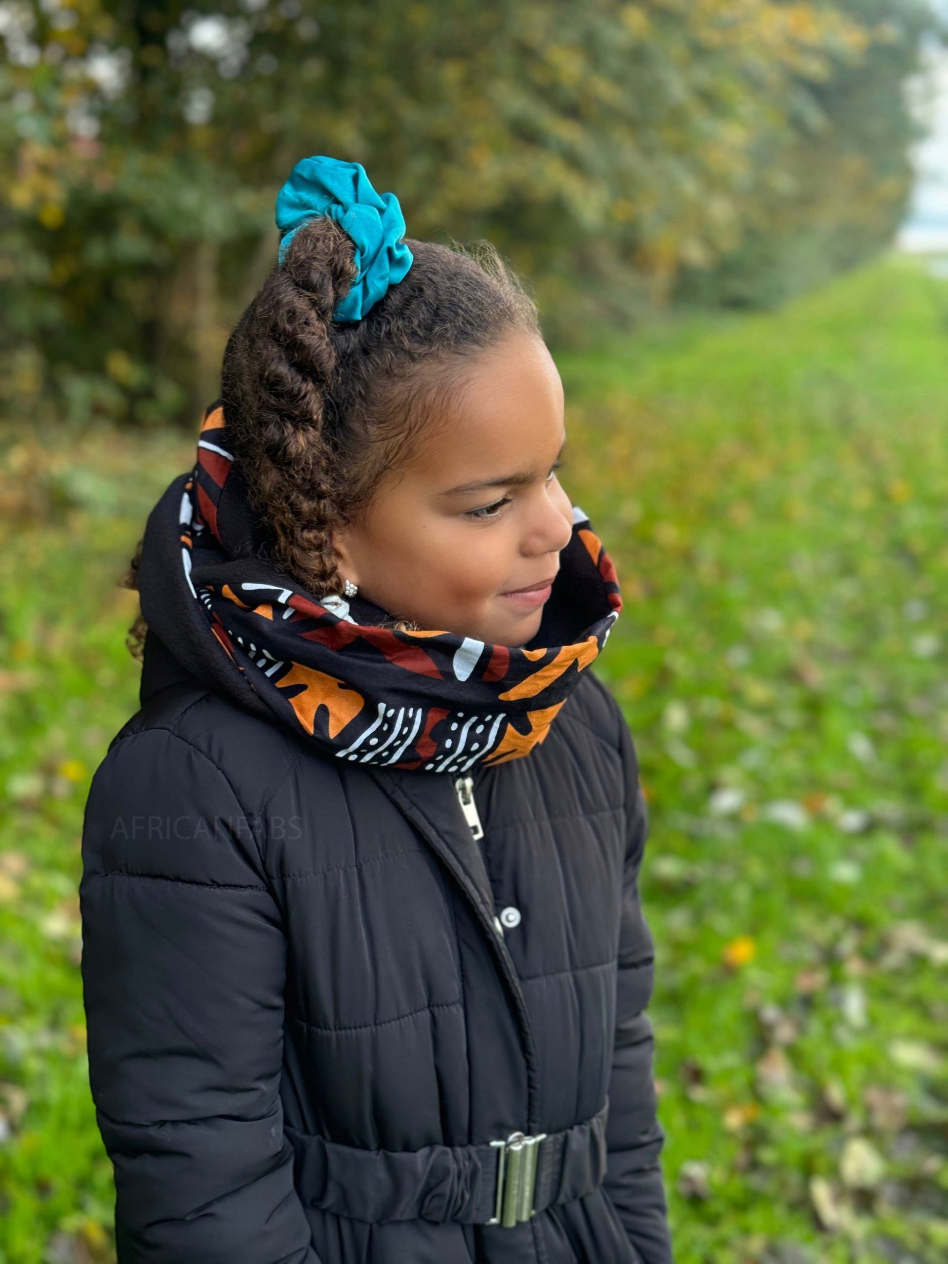 Braided Updo Secured With A Teal Scrunchie Braided Updo Secured With A Teal Scrunchie β Winter Hairstyles for Black Kids