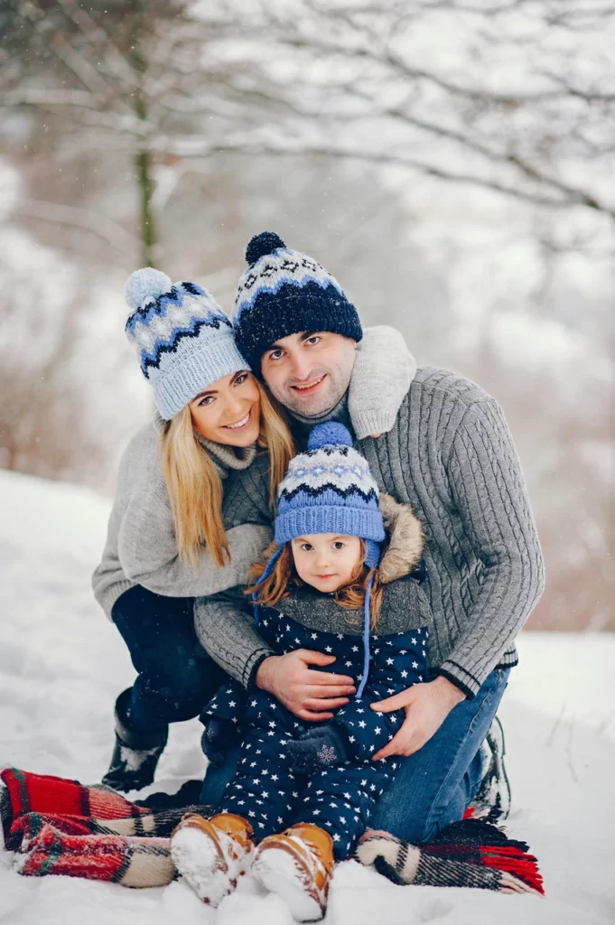 Blue Star Print Jumpsuit and Grey Sweaters: Coordinated Winter Family Look Blue Star Print Jumpsuit and Grey Sweaters: Coordinated Winter Family Look β Winter Family Photo Outfits