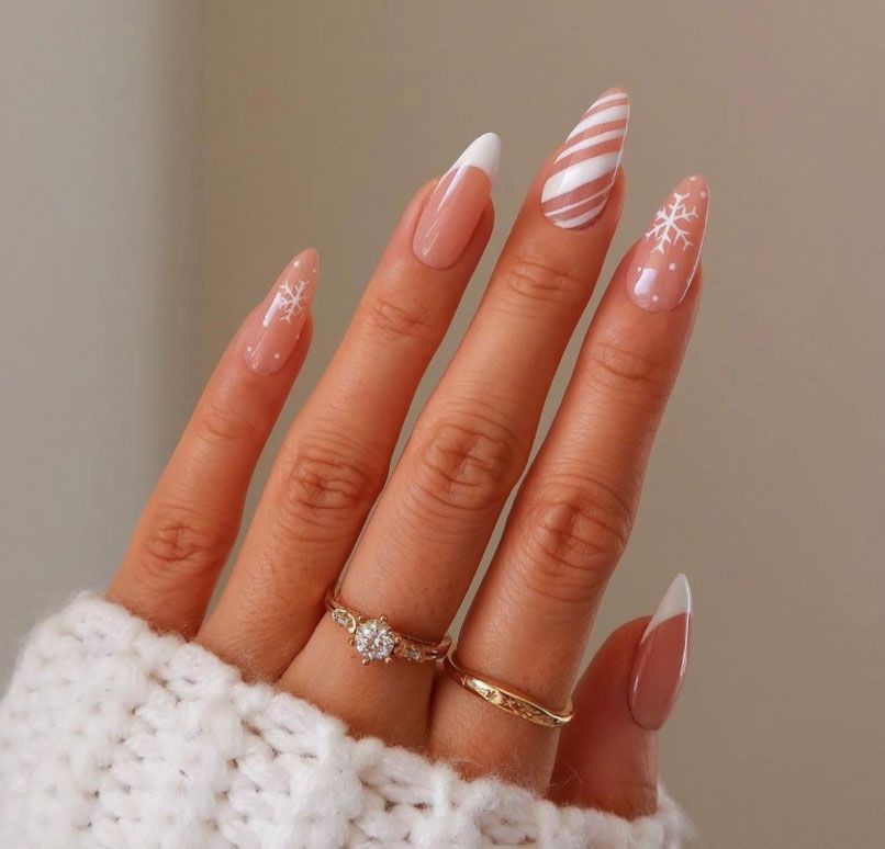 Nude Almond with Candy Cane French Tips Nude Almond with Candy Cane French Tips β Cute Christmas Nails 2026
