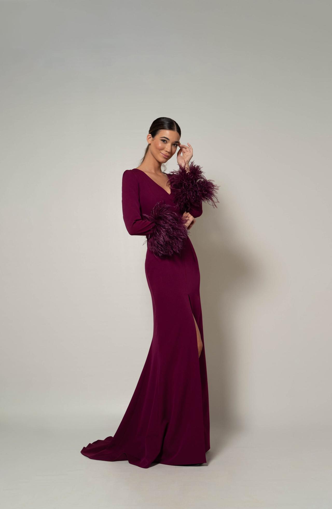 Dramatic Plum Gown with Feather Trim — Winter Wedding Guest Outfits