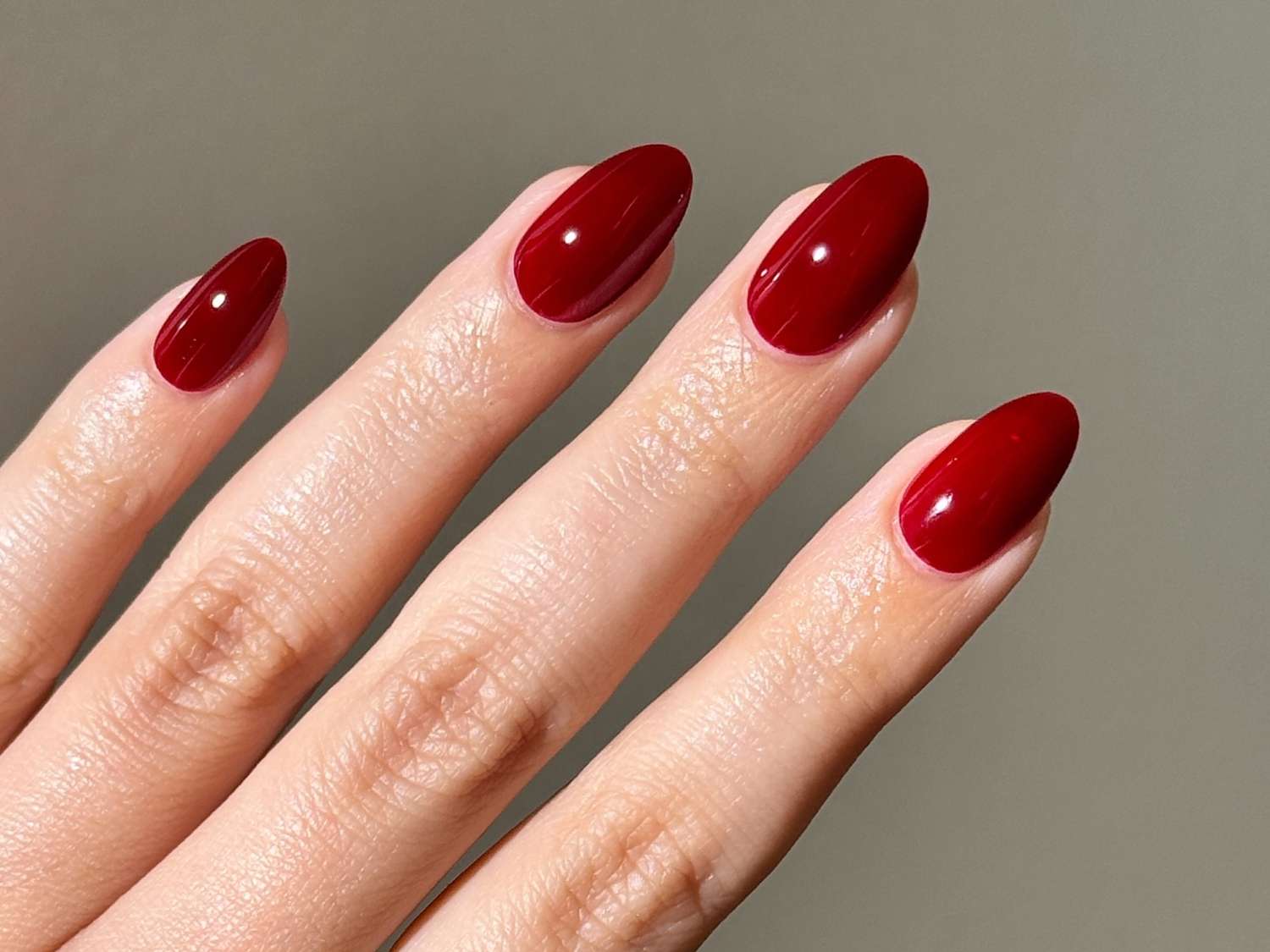 Rich Glossy Deep Red Medium Nails — Winter Nail Colors for Women Over 60