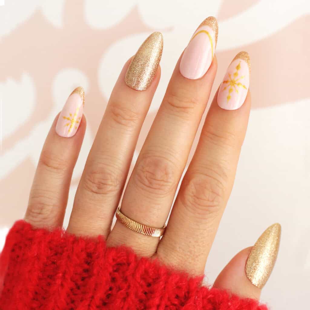 Long Almond Gold Snowflake Sunburst Long Almond Gold Snowflake Sunburst β Winter Gold Nails