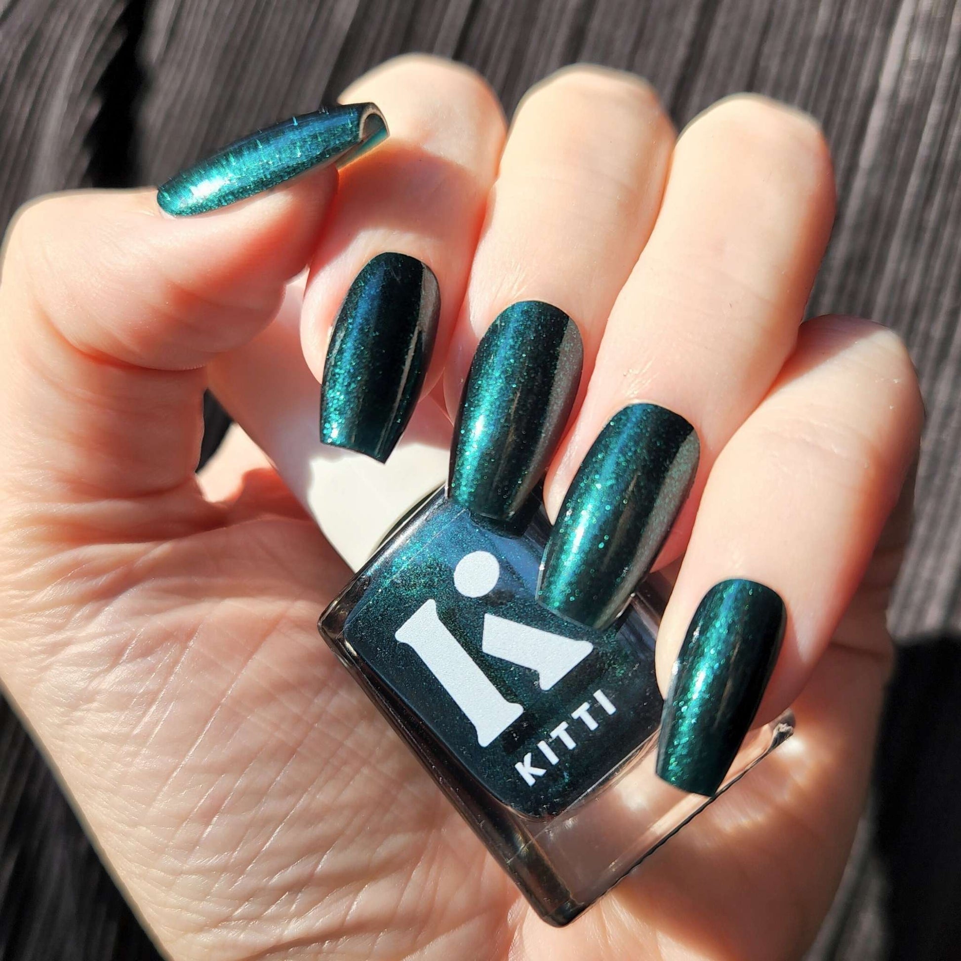 Glitter Visual Idea — Dark Green Winter Nails