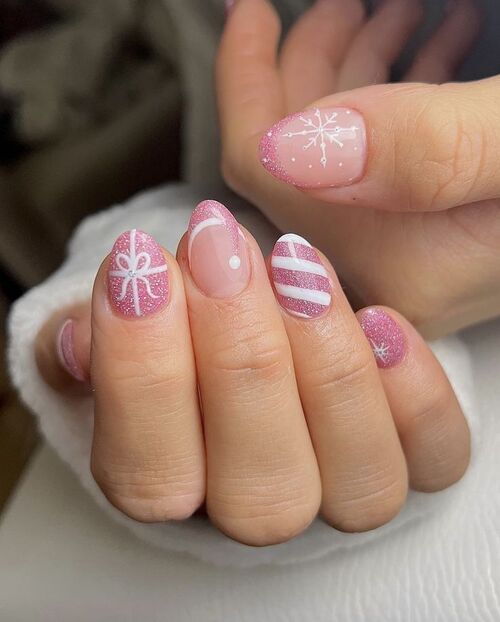 Pink Glitter Festive Motif Oval Nails Pink Glitter Festive Motif Oval Nails β Simple Short Christmas Nails 2026