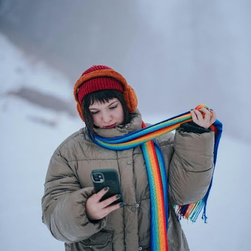 Orange Earmuffs with Rainbow Scarf and Khaki Puffer Jacket Orange Earmuffs with Rainbow Scarf and Khaki Puffer Jacket β Earmuffs Outfits
