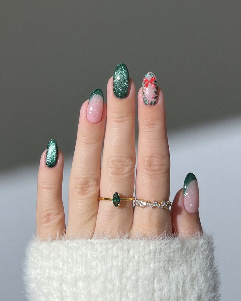 Almond Nails with Glitter French and Festive Bow Accent — Green Christmas Nails 2026