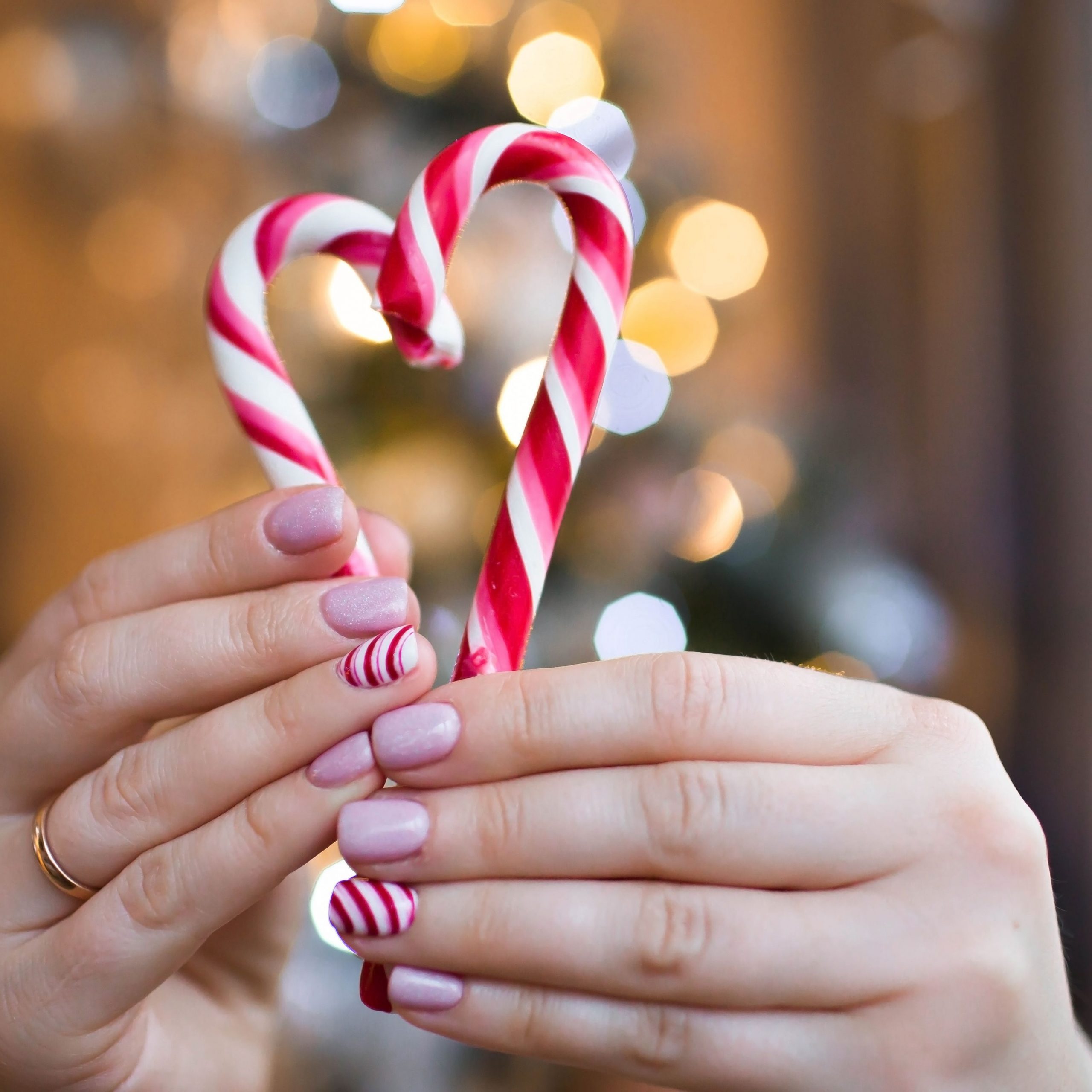 Pale Pink Candy Cane Bows — Short Christmas Nails 2026