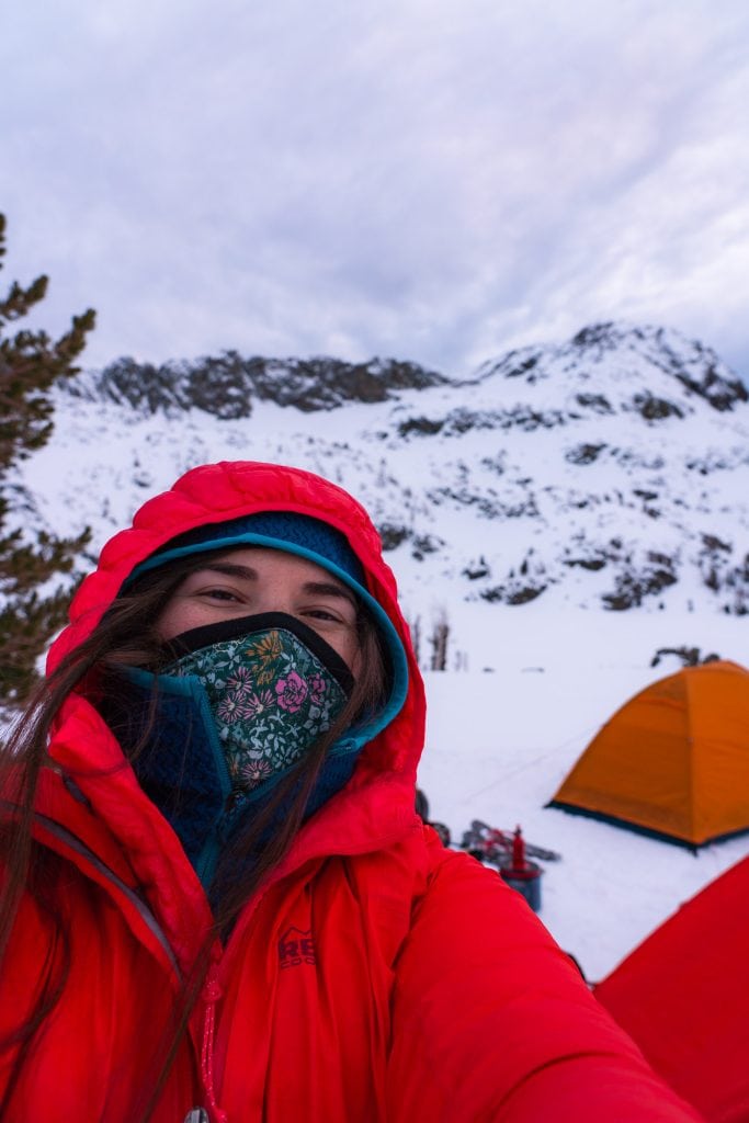Bright Red Puffer Jacket with Floral Mask Bright Red Puffer Jacket with Floral Mask β Winter Hiking Outfits