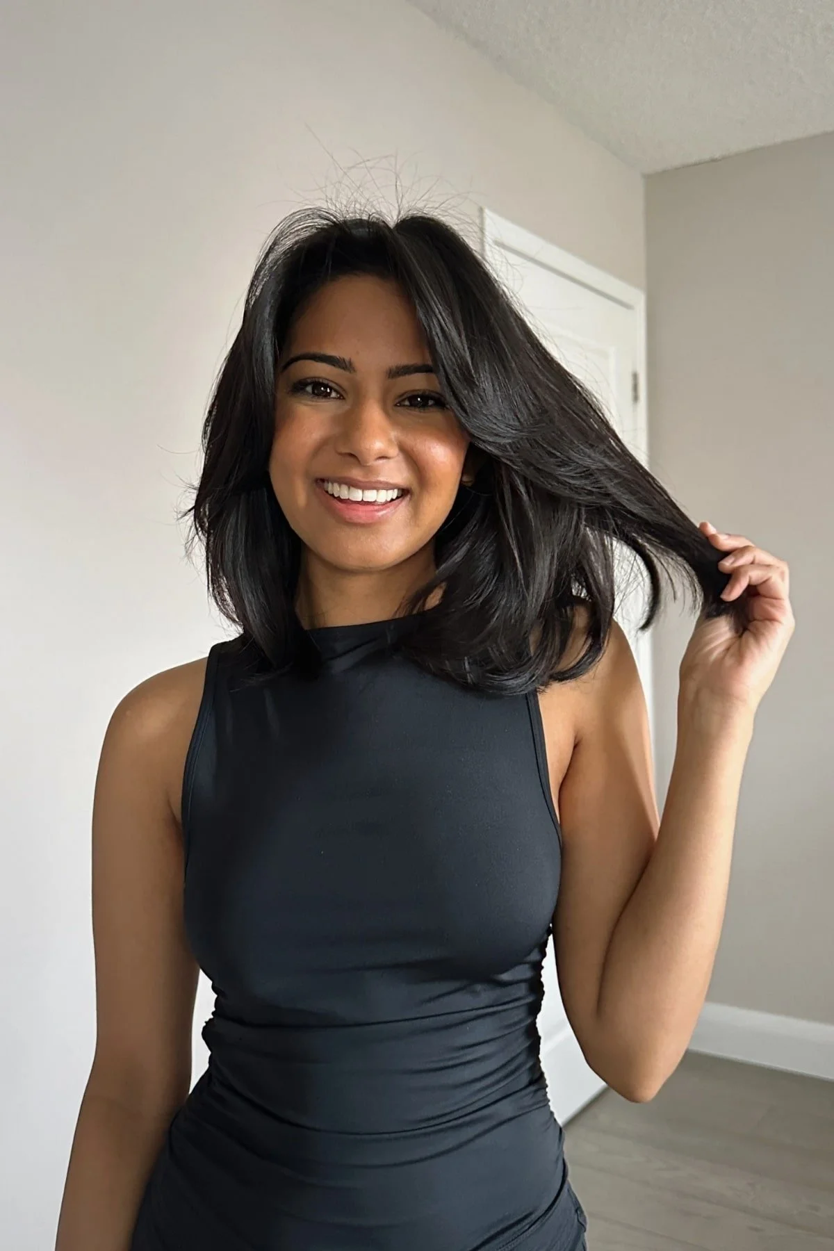 Layered Bob With Smooth Blowout — Medium Length Winter Haircuts