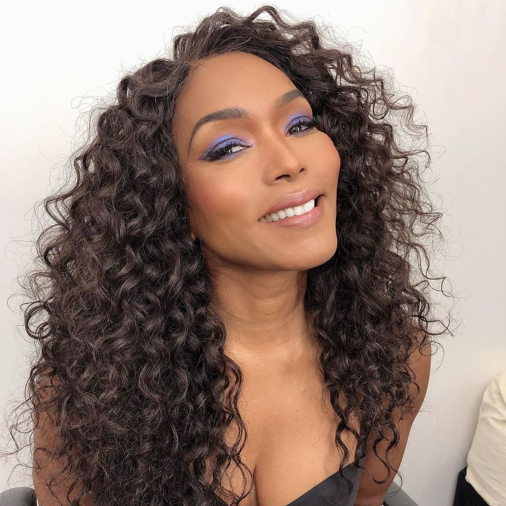Mid-Back Thick Curls With Volume — Winter Haircuts for Curly Hair