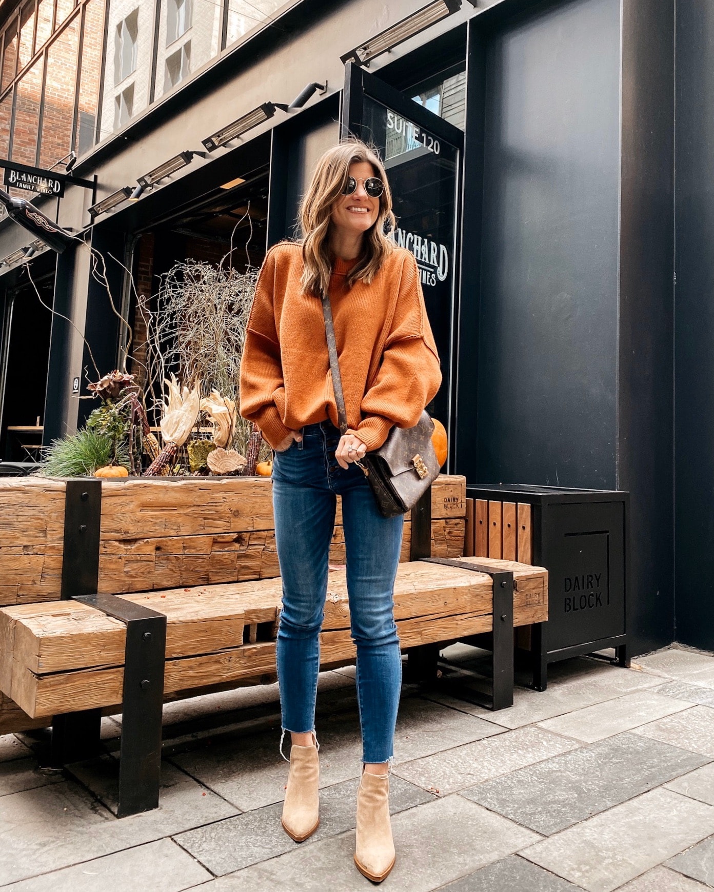 Skinny Blue Jeans with an Orange Oversized Knit Sweater Skinny Blue Jeans with an Orange Oversized Knit Sweater β Winter Outfits with Jeans