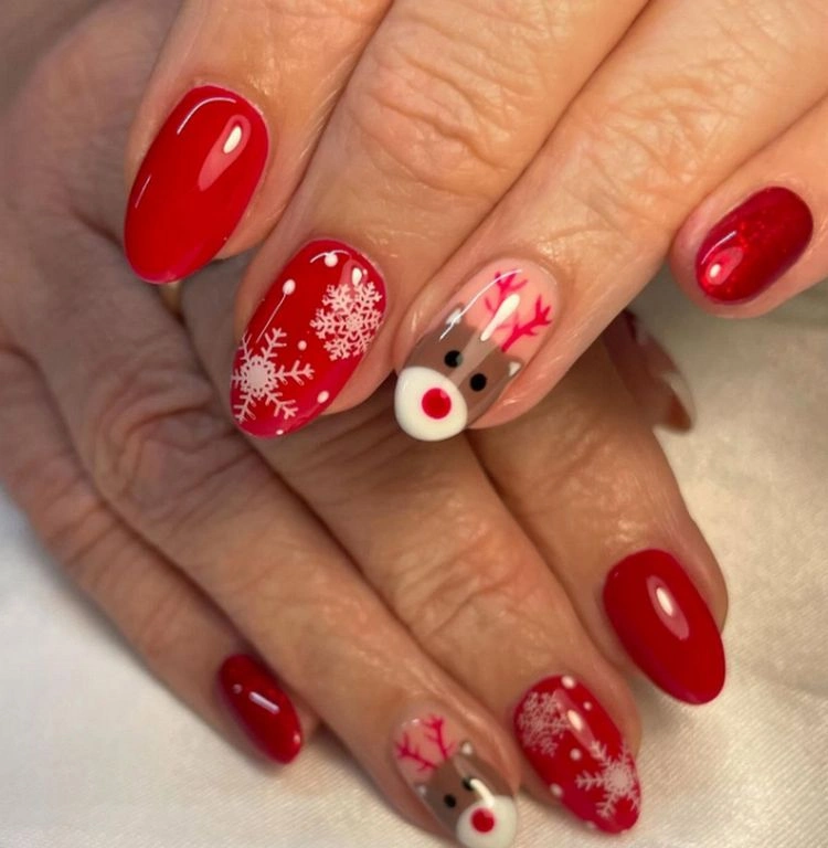 Short Oval Red with Reindeer Faces Short Oval Red with Reindeer Faces β Cherry Red Christmas Nails 2026