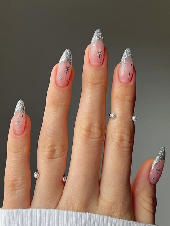 Sheer Pink with Glitter Tips & Star Accents Sheer Pink with Glitter Tips & Star Accents β Long Winter Almond Nails