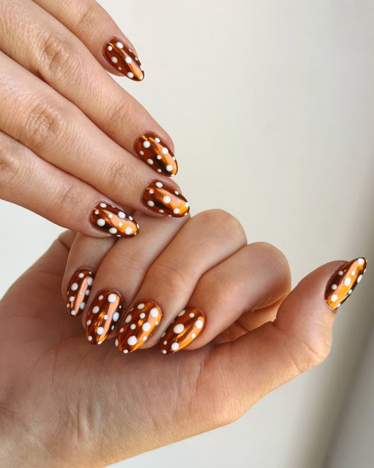 Metallic Copper Chrome with Polka Dots Metallic Copper Chrome with Polka Dots β Winter Nail Trends