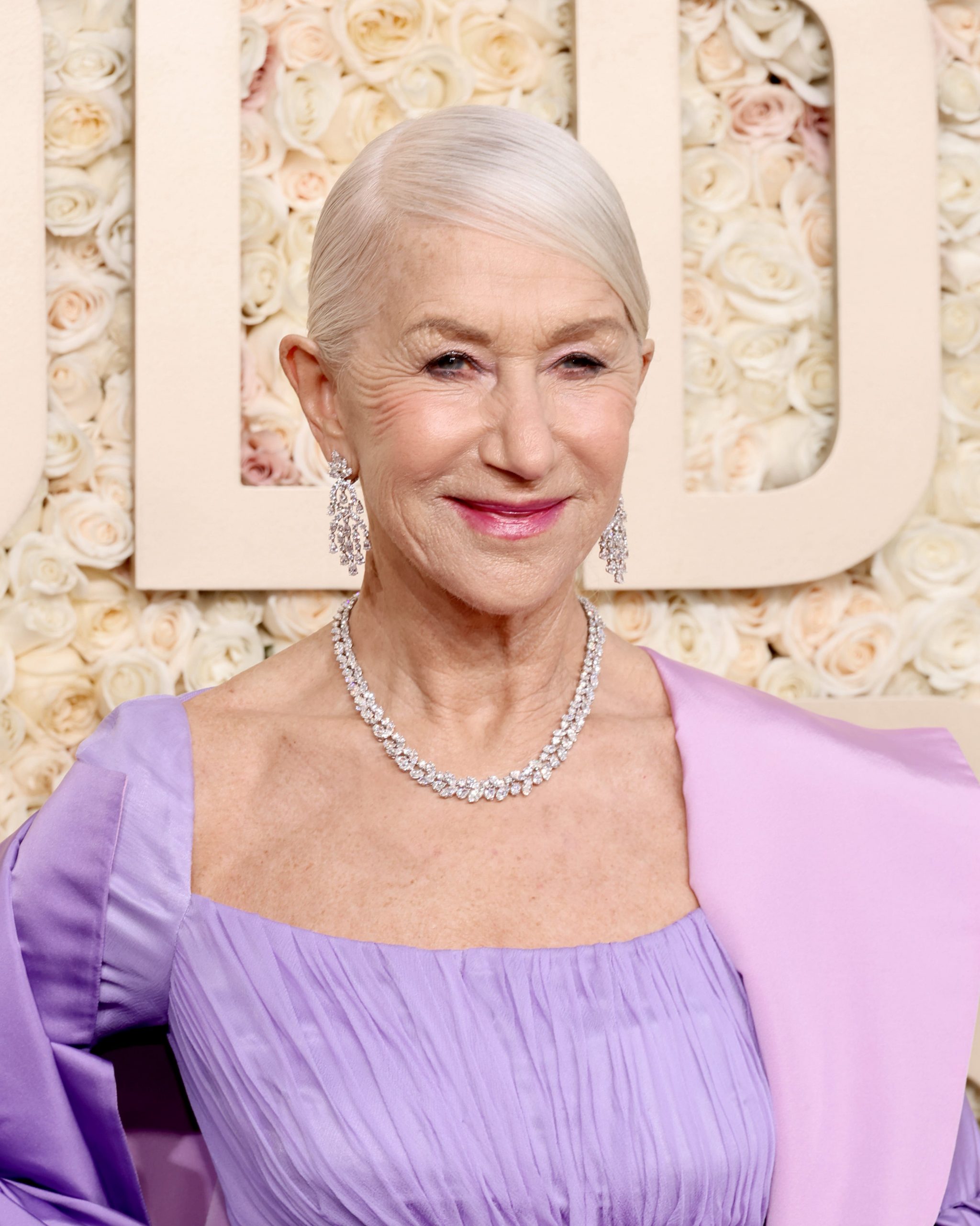Slicked Back Silver Grey — Winter Hairstyles for Women Over 60
