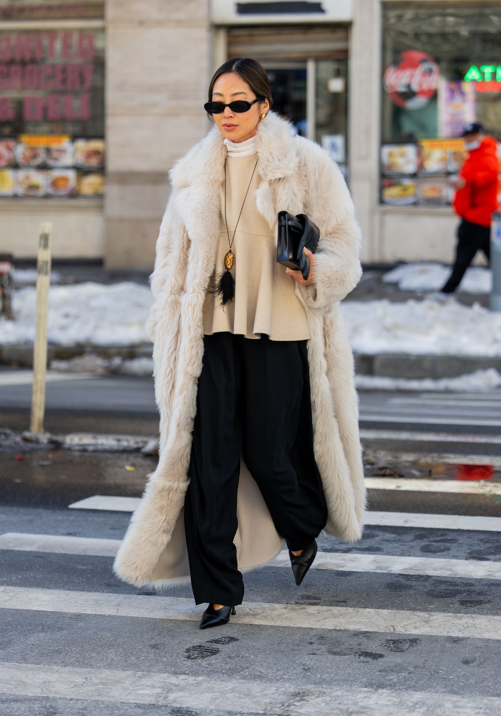 Elegant Cream Faux Fur and Black Trousers — NYC Winter Outfits
