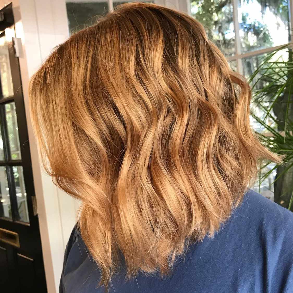 Strawberry Blonde Bob Side Swept Bangs — Winter Hair Colors for Short Hair