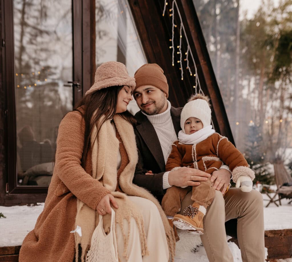 Cozy Neutrals: Textured Coat and Cream Dress for a Snowy Family Portrait Cozy Neutrals: Textured Coat and Cream Dress for a Snowy Family Portrait β Winter Family Photo Outfits
