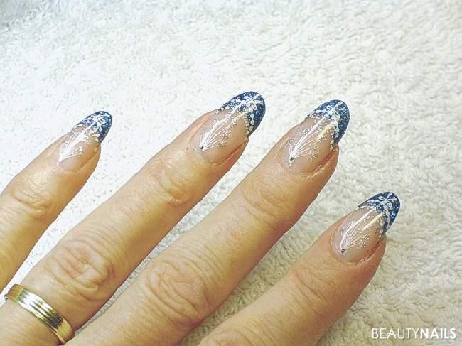 Dark Blue French with Snowflakes and Glitter Dark Blue French with Snowflakes and Glitter β Christmas Oval Nails 2026