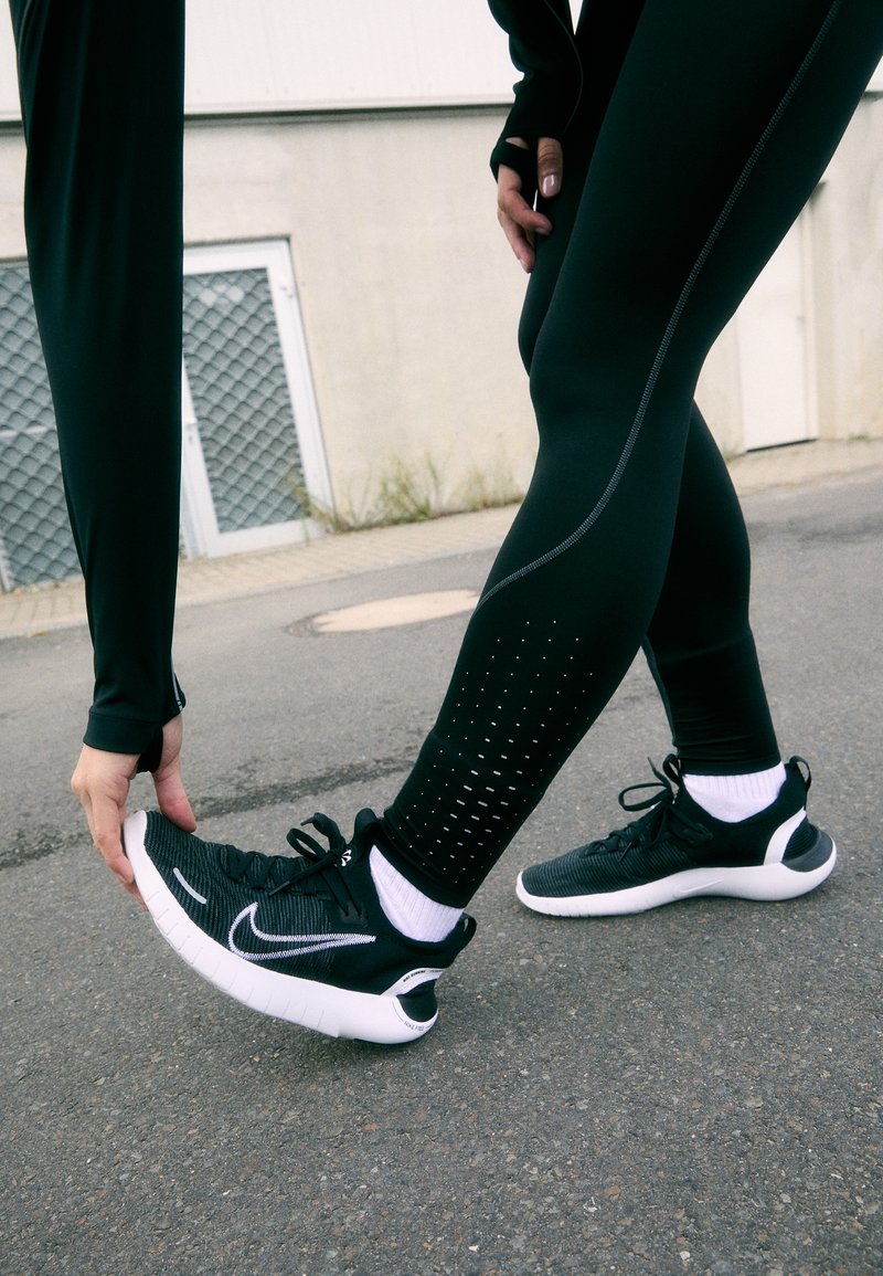 Performance Details: Black Leggings with Perforated Details Performance Details: Black Leggings with Perforated Details β Winter Outfits with Leggings