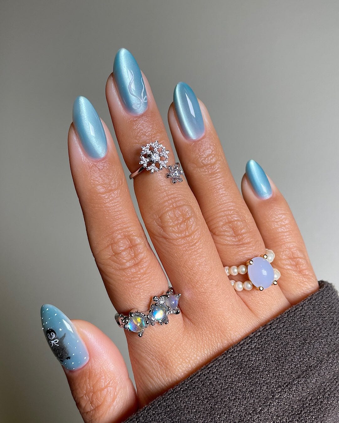 Light Blue Shimmering Cat-Eye Swirl — Winter Nails for Teens