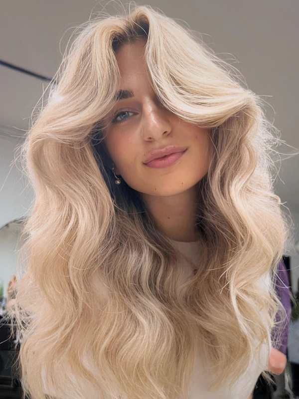 Collarbone Ash Blonde Voluminous Waves — Winter Hair Colors for Blondes