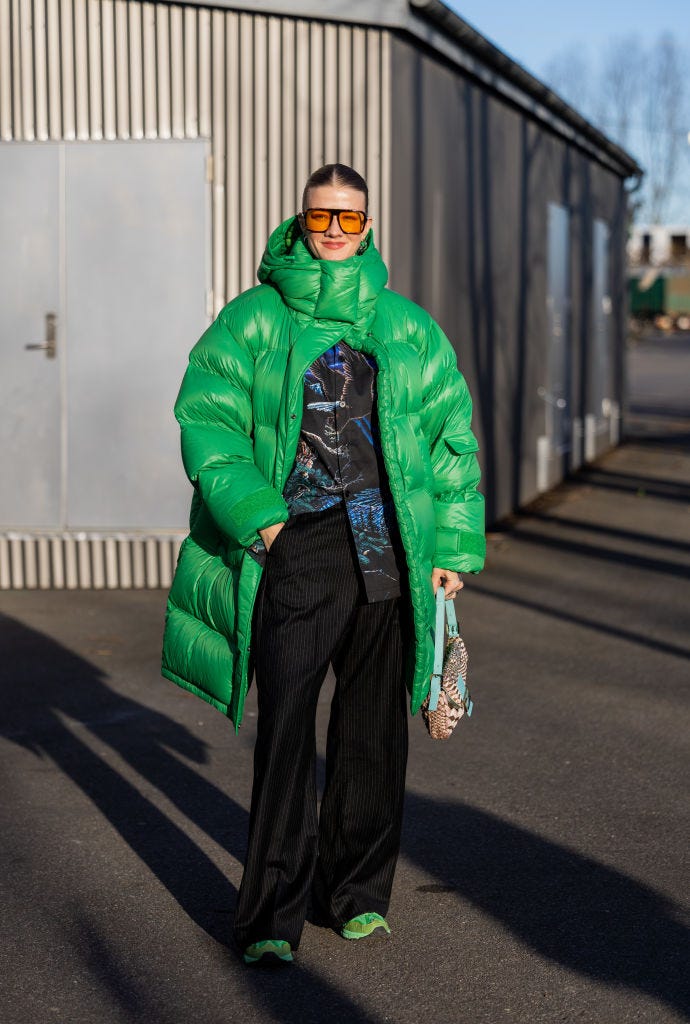 Vibrant Red Puffer Jacket With White Corduroy Pants — Long Puffer Coat Outfits