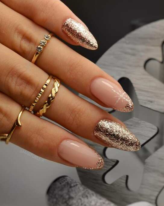 Nude with Gold Glitter & Snowflake Accent — Minimalist New Years Nails 2027