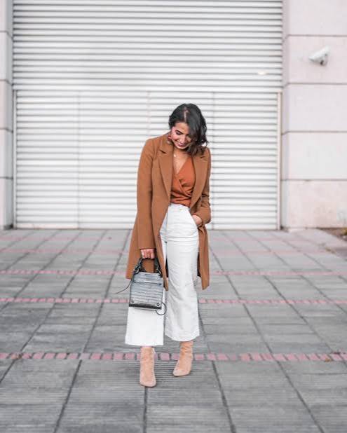 Brown Coat Over Orange Satin Top and White Culottes — Neutral Winter Outfits