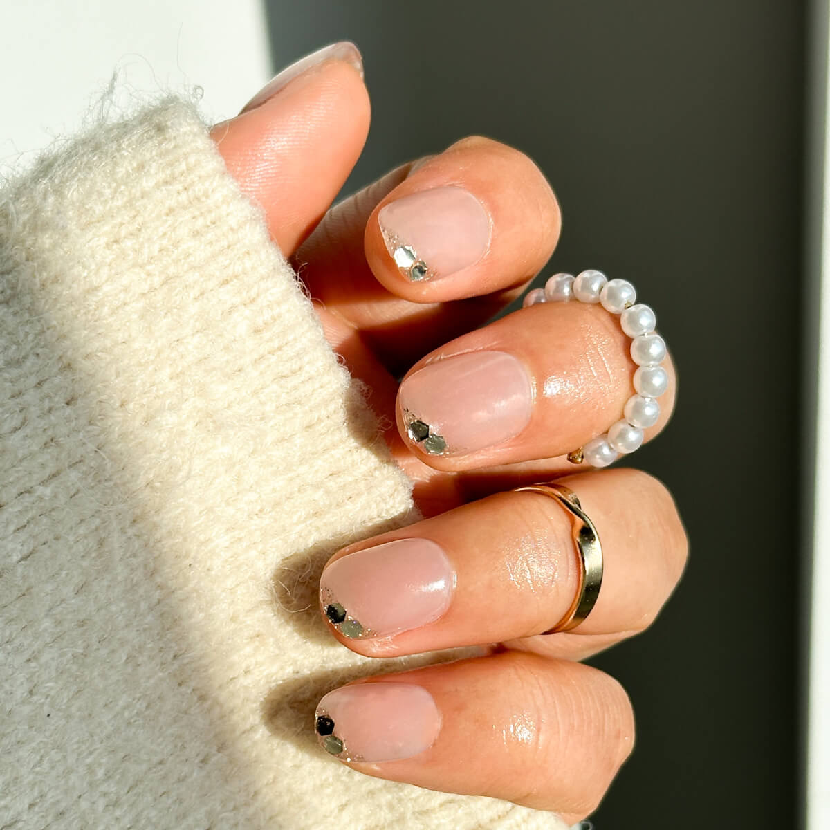 Sheer Pink French with Silver Glitter Tips — Short Winter Gel Nails
