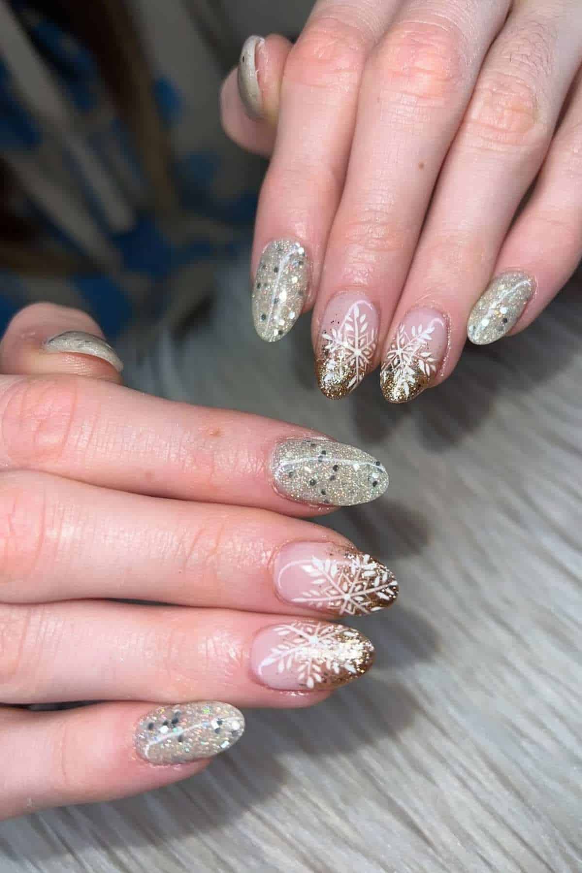 Both Hands Medium Shot Medium Almond Snowflake Glitter Both Hands Medium Shot Medium Almond Snowflake Glitter β Winter Gold Nails