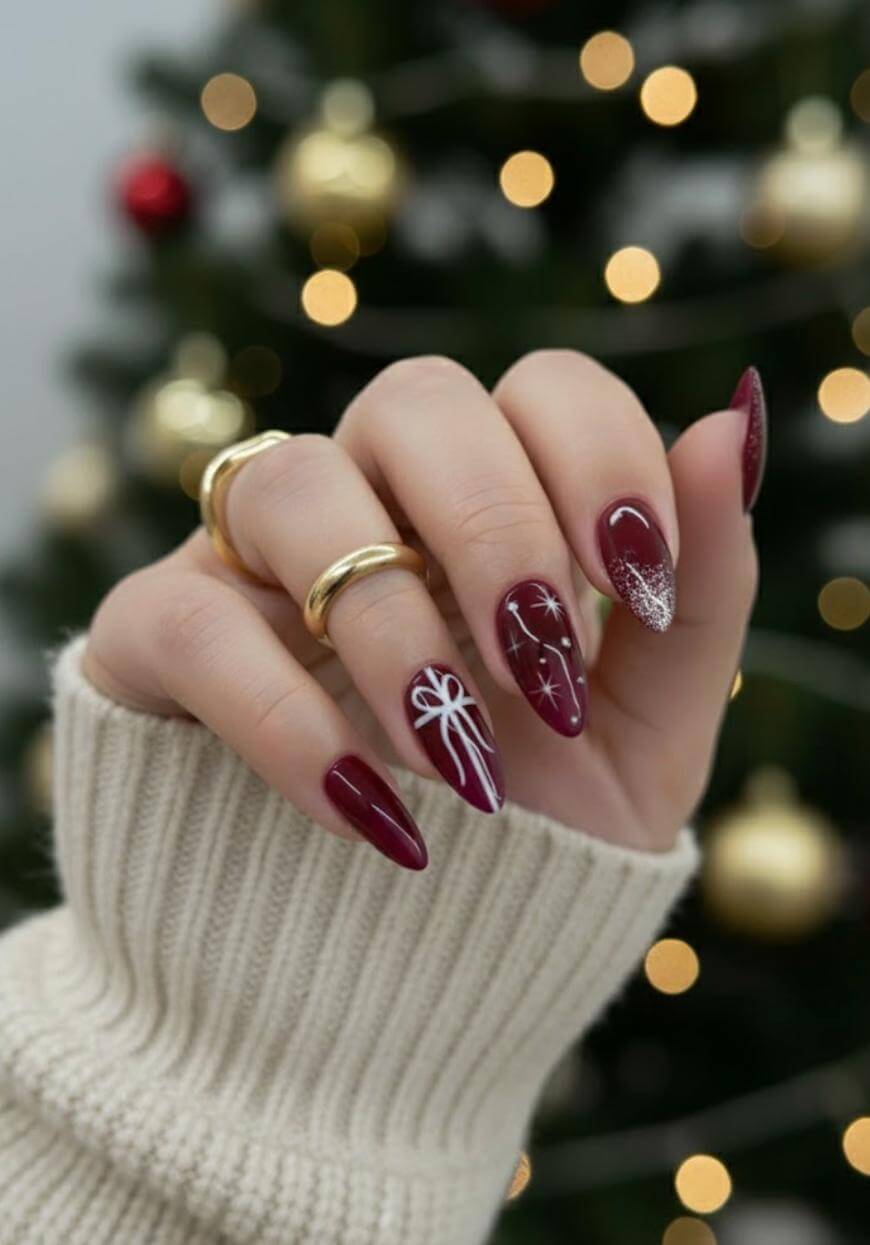 Burgundy Stilettos with White Bows and Stars Burgundy Stilettos with White Bows and Stars β Christmas Nails for Women Over 50 2026