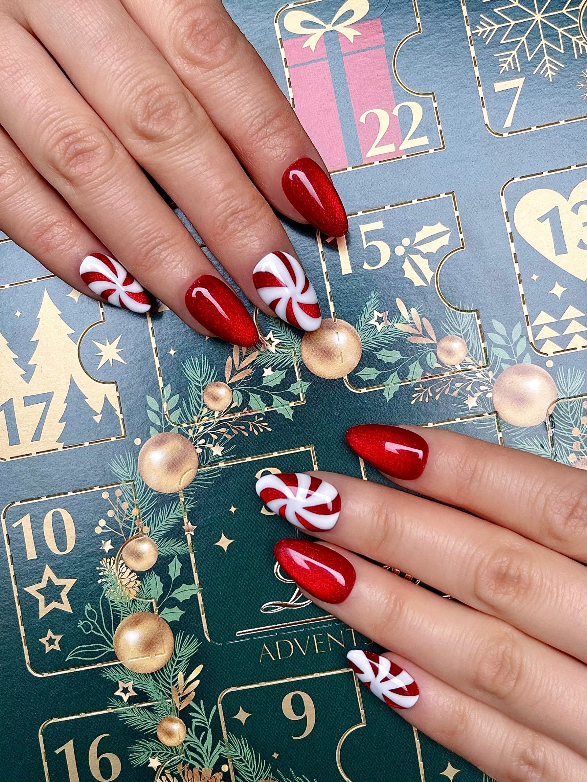 Bright Red with Candy Cane Stripes Bright Red with Candy Cane Stripes β Christmas Almond Nails 2026