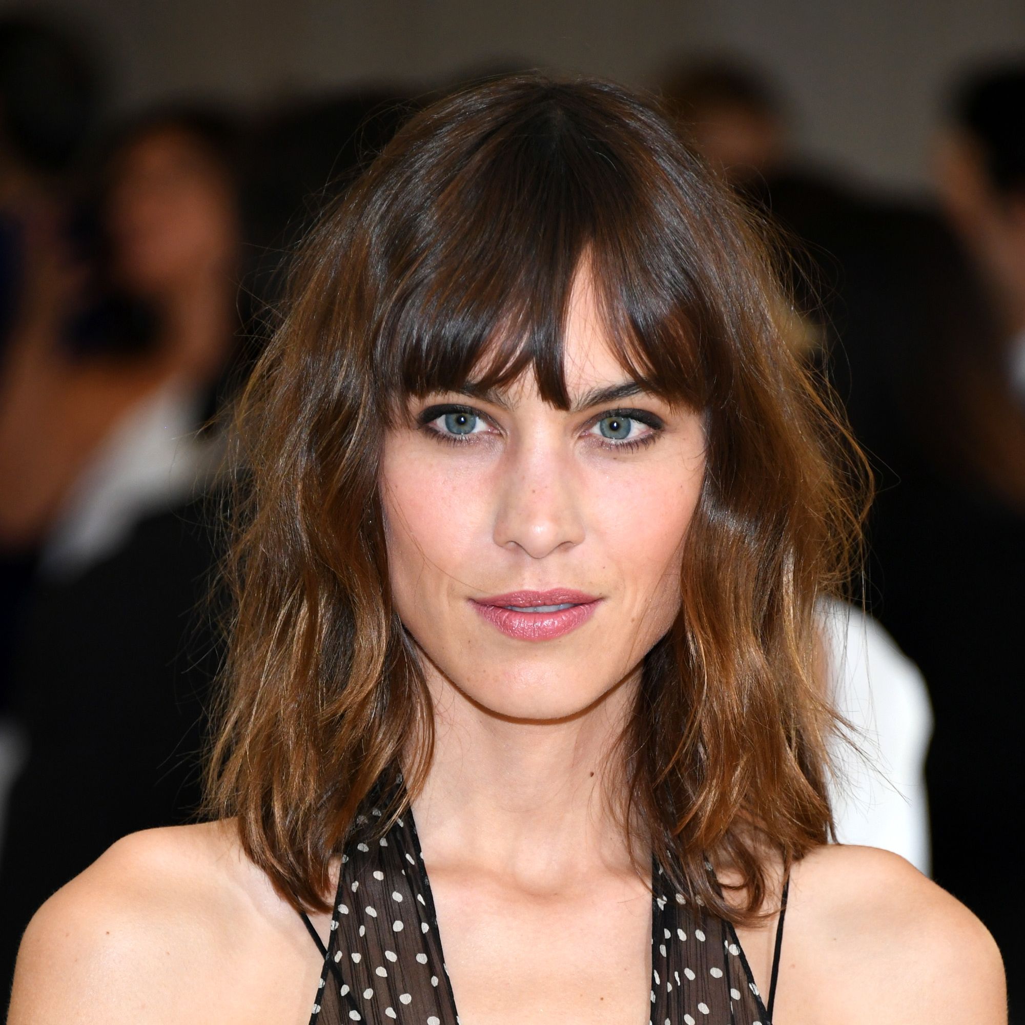 Chin Length Wavy Bob With Wispy Bangs — Winter Shoulder Length Hairstyles
