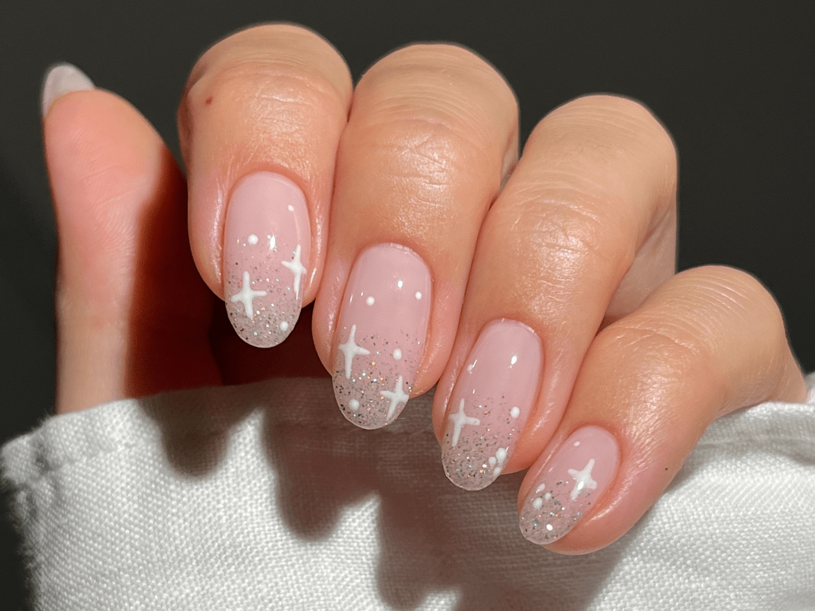 Pale Pink Oval Glitter Cross Nails Pale Pink Oval Glitter Cross Nails β Subtle Christmas Nails 2026