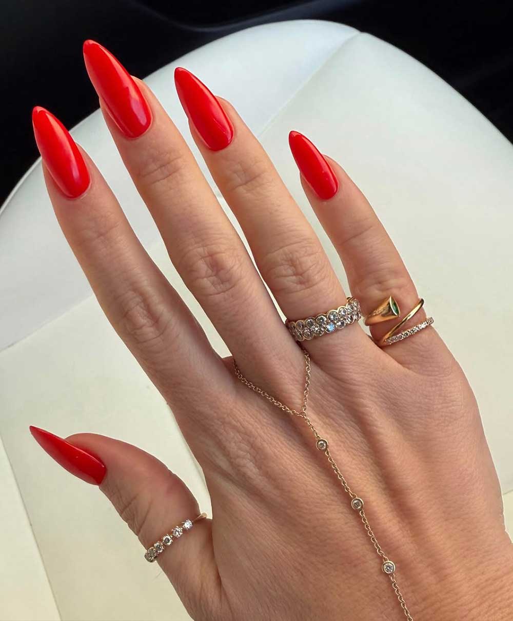 Vibrant Glossy Red Stilettos with Rings — Holiday Nail Colors 2026
