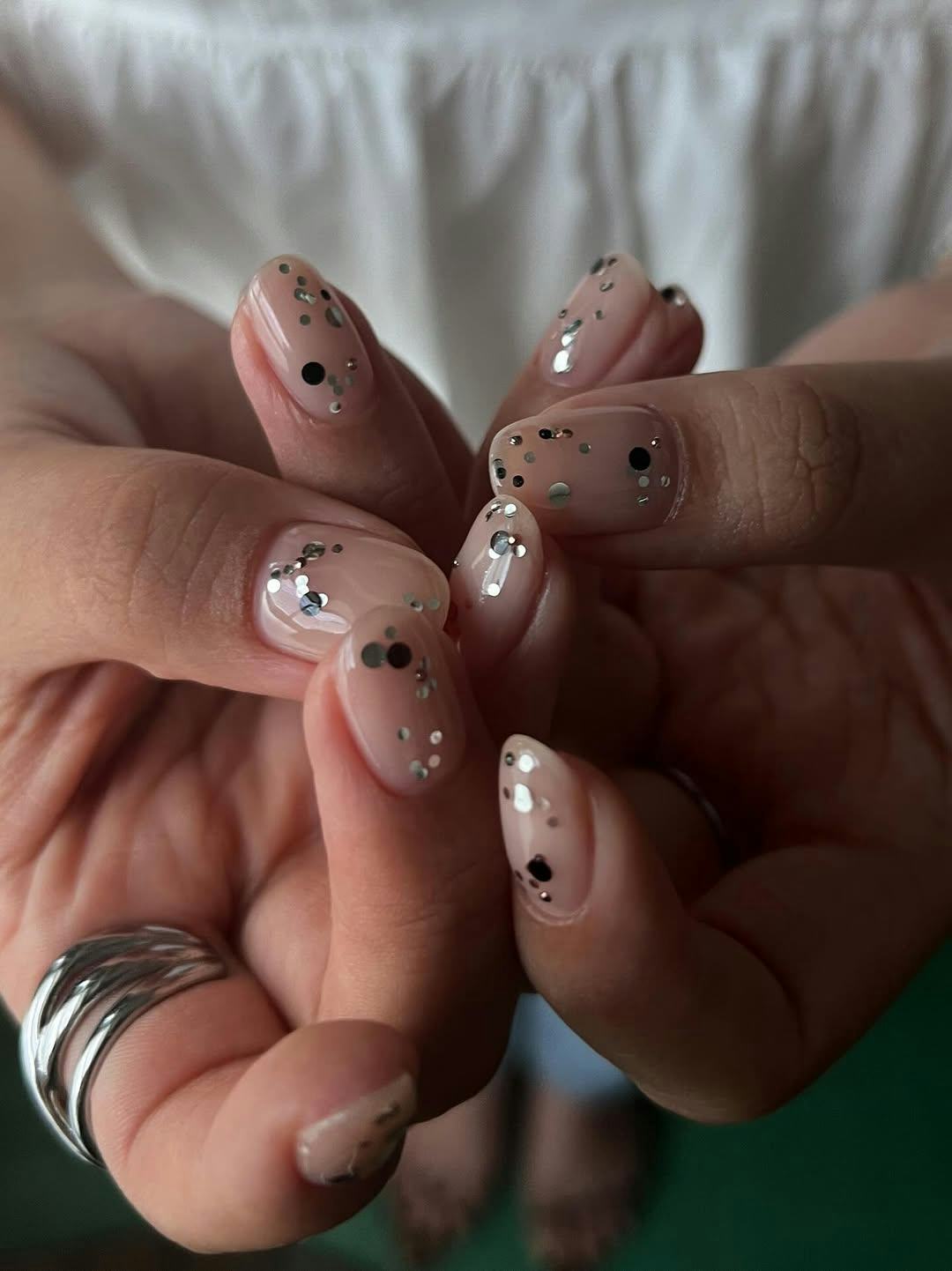Short Oval Glitter and Dot Accents Short Oval Glitter and Dot Accents β Winter Nail Trends