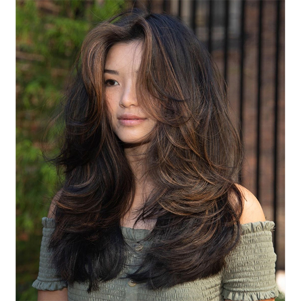 Layered Collarbone Cut with Blowout — Winter Haircuts for Wavy Hair