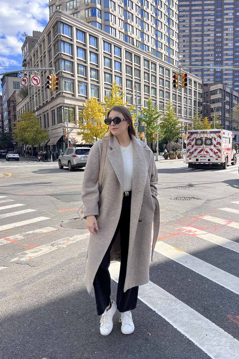 Belted Beige Coat with White Sneakers and Crossbody Bag — January Outfits
