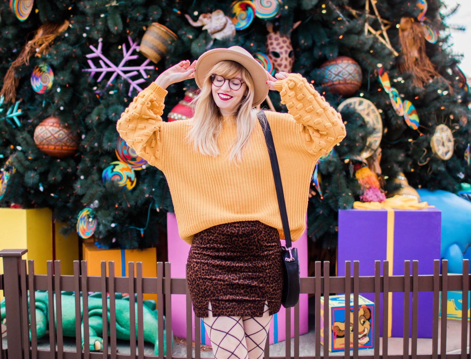 Vibrant Yellow Knit Sweater with Leopard Skirt for a Festive Holiday Vibe Vibrant Yellow Knit Sweater with Leopard Skirt for a Festive Holiday Vibe β Disney Winter Outfits