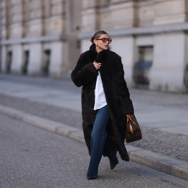 Long Black Faux Fur Coat with Jeans and Monogrammed Bag Long Black Faux Fur Coat with Jeans and Monogrammed Bag β Black Coat Outfits