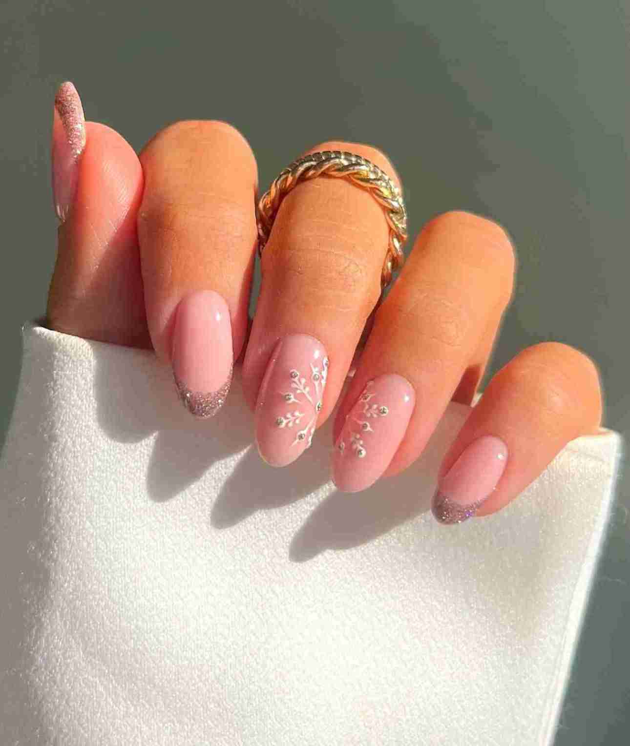 Pale Pink Oval with Snowflake and Glitter Tips Pale Pink Oval with Snowflake and Glitter Tips β Coquette Winter Nails