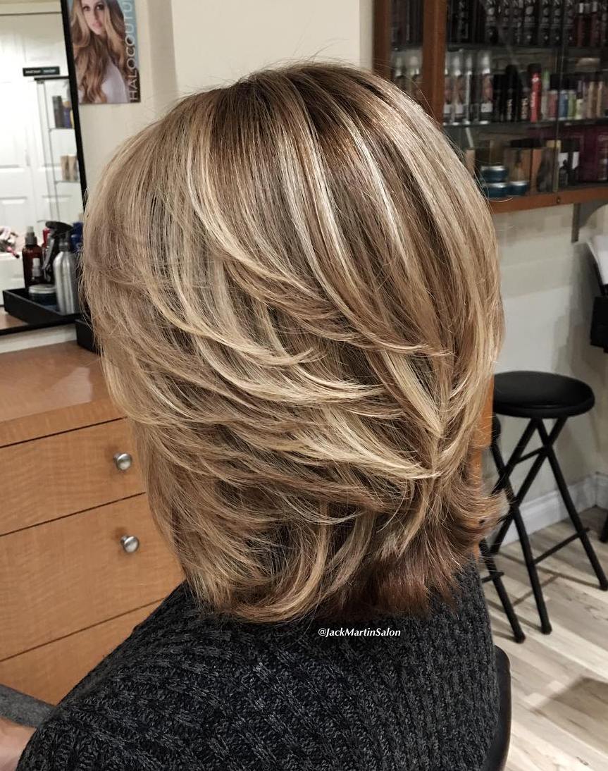 Honey Blonde Feathered Layers Honey Blonde Feathered Layers β Winter Hairstyles for Women Over 50