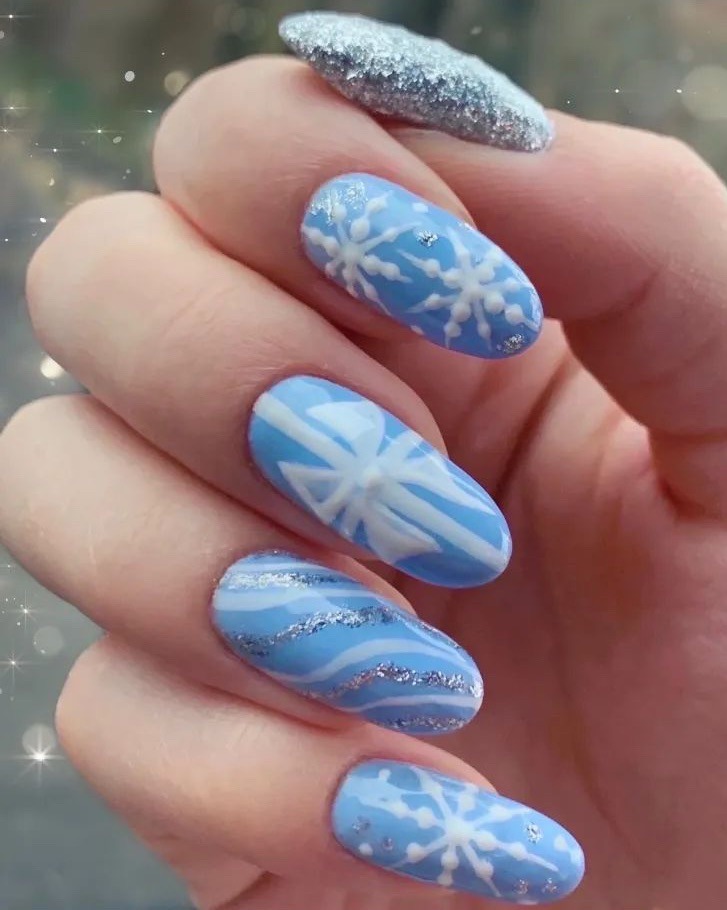 Medium Almond Light Blue Glitter Snowflakes — Winter Nail Designs