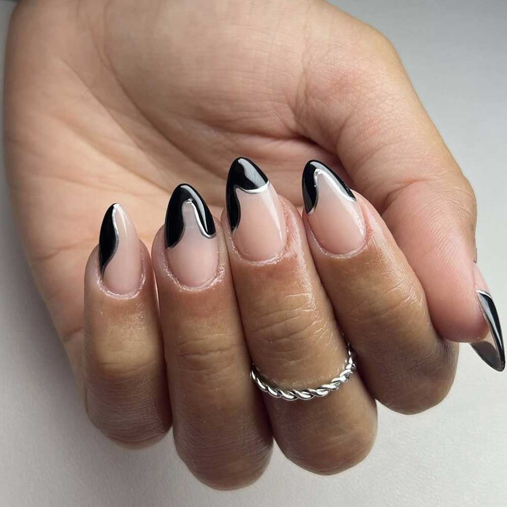 Almond Abstract Black French Tips — Simple New Years Nails 2027