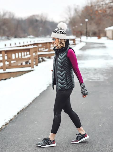 Black Quilted Vest Over Magenta Top and Leggings Black Quilted Vest Over Magenta Top and Leggings β Winter Athleisure Outfits
