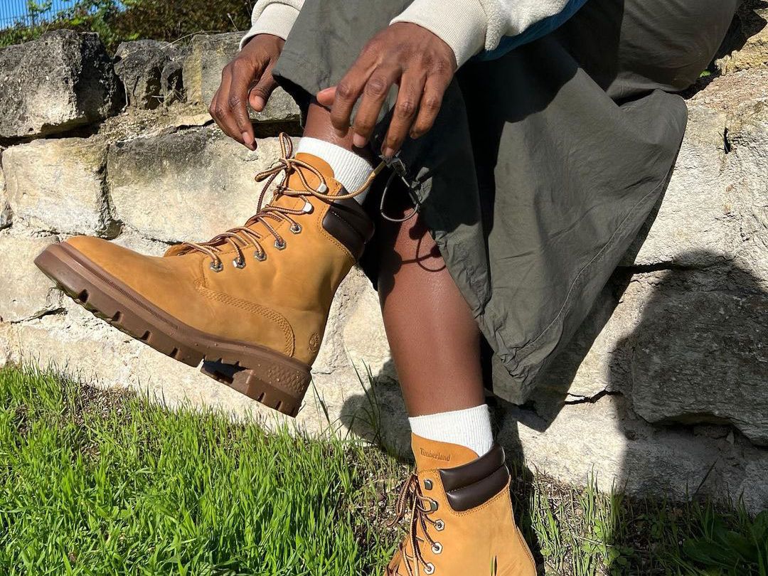 Travel-Ready: Denim Jacket, Ripped Jeans, and Tan Timberlands — Timberland Boots Outfits