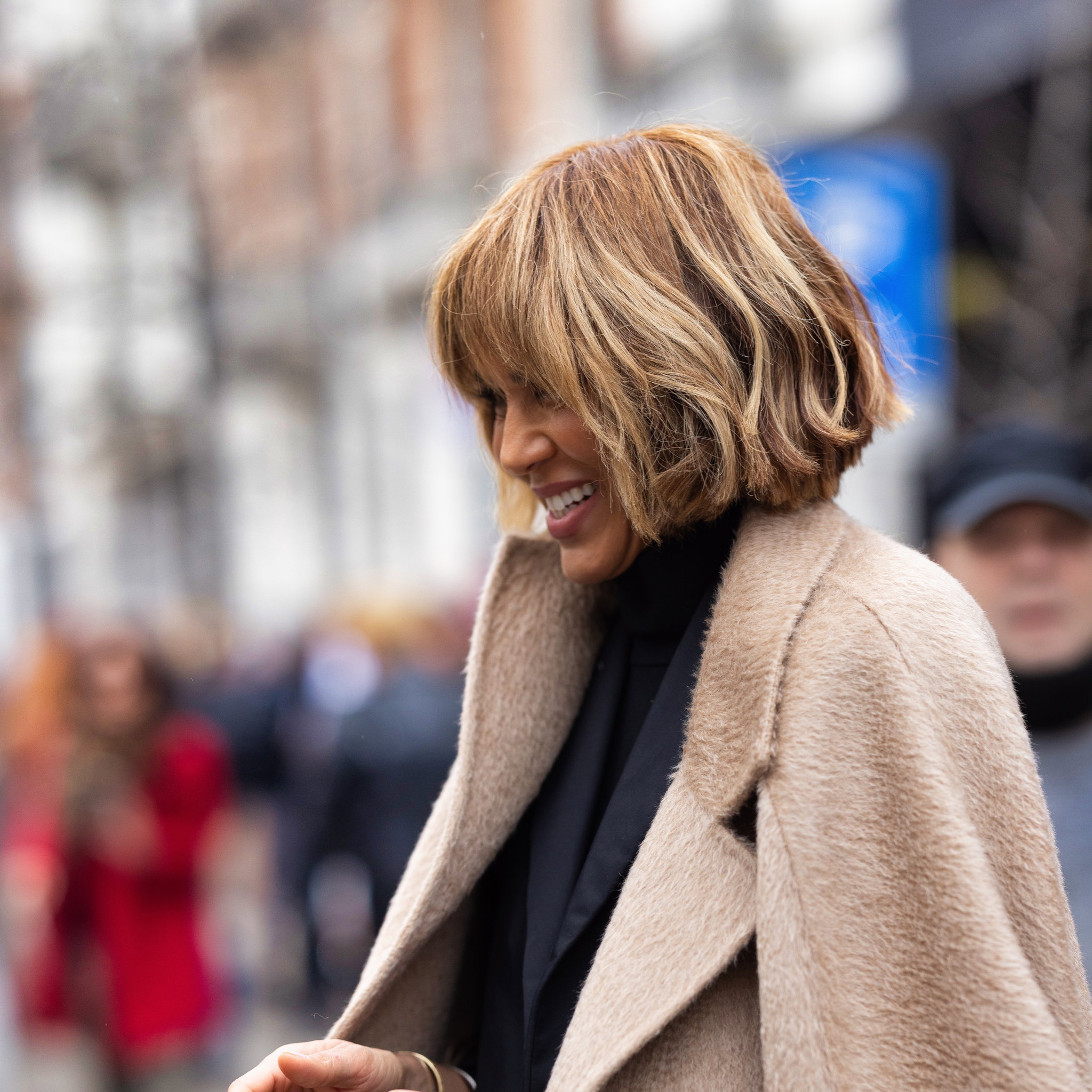 Honey Blonde Angled Bob With Choppy Bangs — Winter Haircuts for Women Over 60
