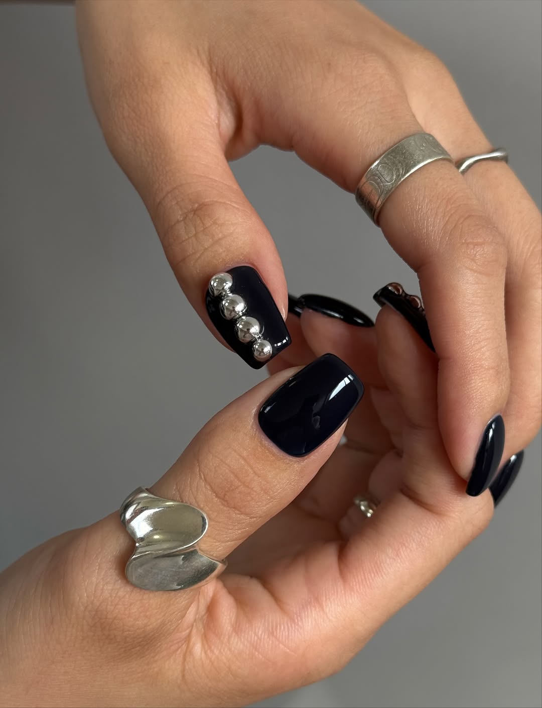 Gold Glitter Accent Wavy Line Almond Nails Gold Glitter Accent Wavy Line Almond Nails β NYE Nails 2027